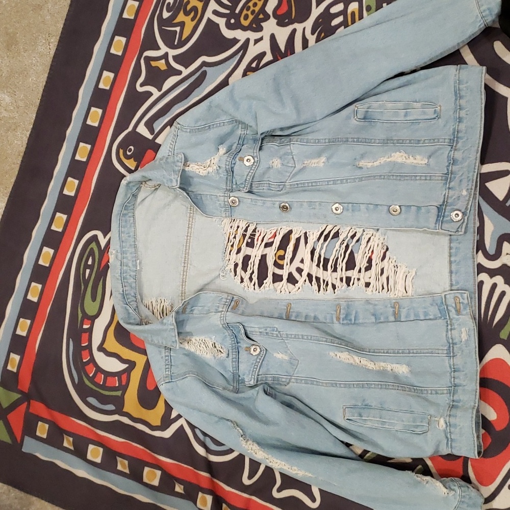 Ripped jean jacket